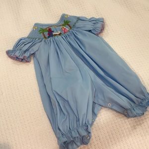 Nativity smocked bubble romper. EUC.